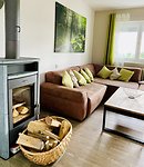 Wohnzimmer 1. OG mit gemütlichem Kaminofen